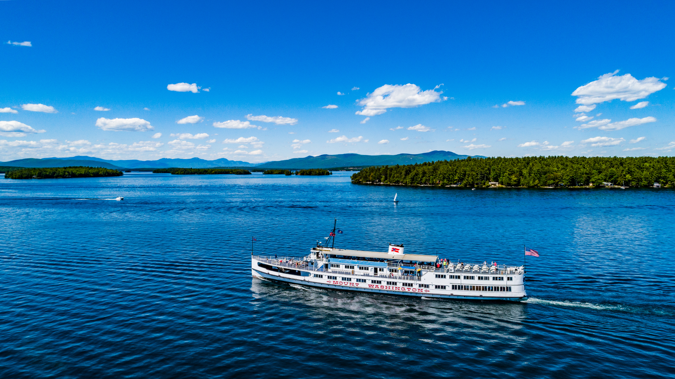 Experience the natural beauty and vibrant lake culture of New Hampshire's Lakes Region aboard the iconic MS Mount Washington on Lake Winnipesaukee